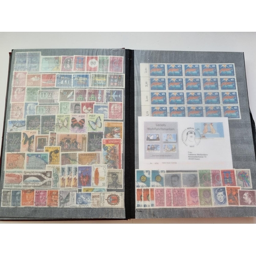 62 - A Stock Book of Irish and German Stamps also to include First Day Covers and others.