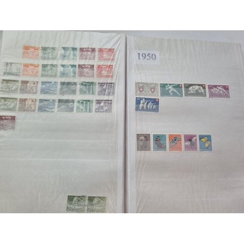 64 - A quantity of Switzerland Stamps in three Books (1 with few).