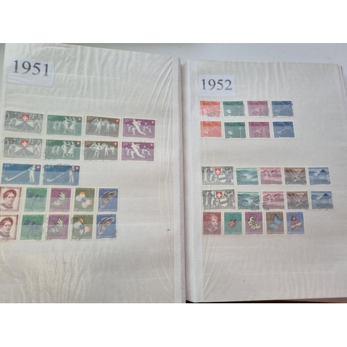 64 - A quantity of Switzerland Stamps in three Books (1 with few).