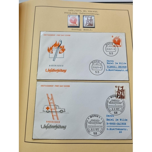 67 - A good folder of German First Day Covers to include some mint Stamps.