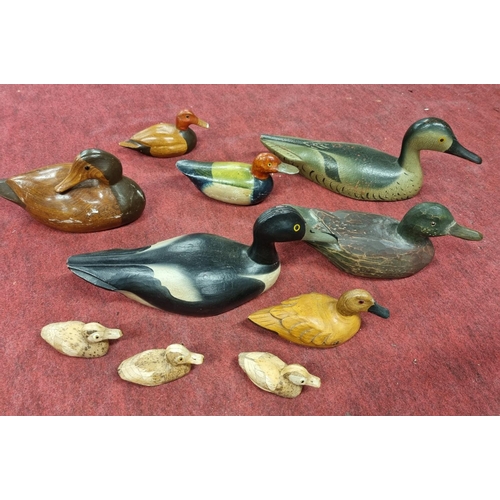 157 - A quantity of timber Ducks.