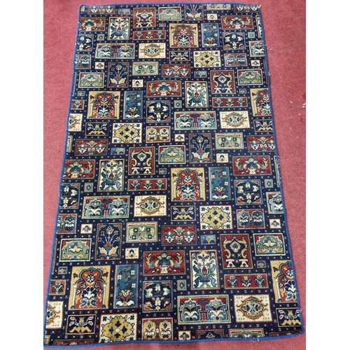 175 - A medium size modern Rug. 206 x 124 cm approx.