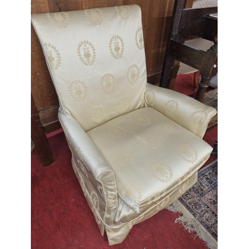 60 - A 20th Century Armchair in gold/cream fabric. W 71 x seat H 38 cms approx, along with  a large Deers... 