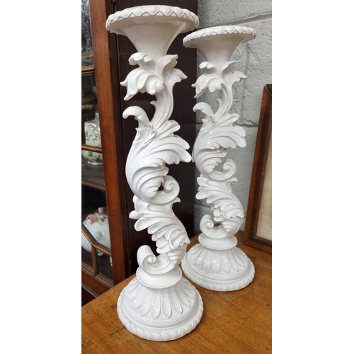 722 - Two Candle Holders. H 43 cm approx along with a Royal Doulton Images Figure 'First Step' along with ... 