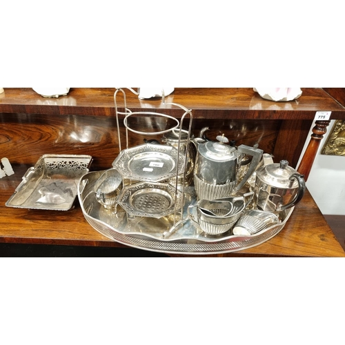 723 - A really good quantity of Silver Plate to include Teapot, mil jug, a large oval pierced tray and cak... 