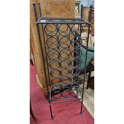 90 - A Metal Wine Rack Stand. 40 x 30 x H 128  cms approx.