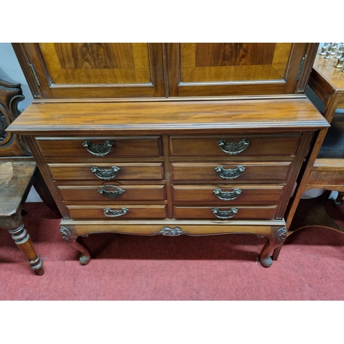 92 - A good early 20th Century Mahogany Cupboard with shelved interior top and a bank of eight drawers an... 