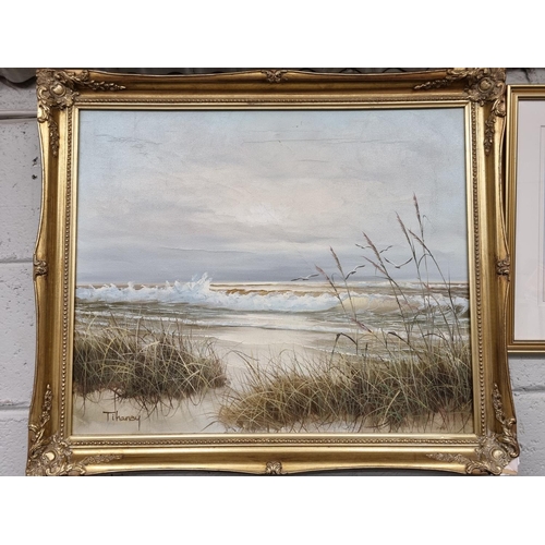 107 - A 20th Century Oil on Canvas of sand dunes and waves breaking on a seashore. Signed Tihaney LL. In a... 