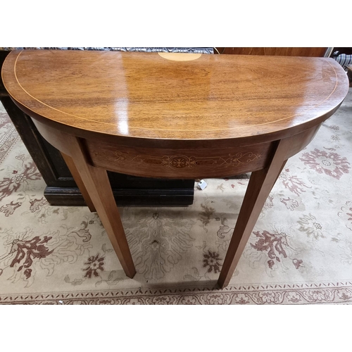 84 - A 20th Century Mahogany half moon Table with satinwood inlay on square tapered supports. w 91 x 42 x... 