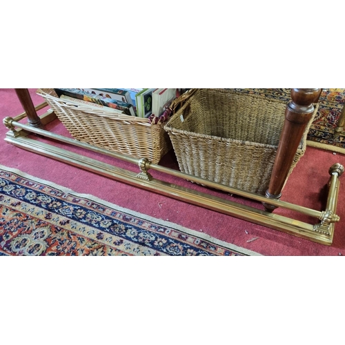 91 - A late 19th Century Brass Fender with turned top. Ope 136 x 30  cms approx.