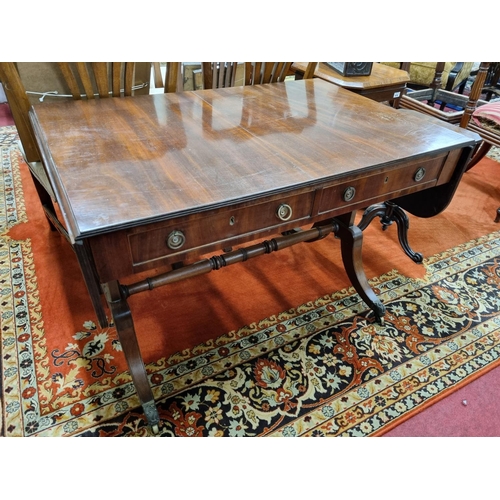 732 - A 19th Century Mahogany Sofa Table with twin frieze drawers on splayed stretcher base. 69 x 156 x H ... 