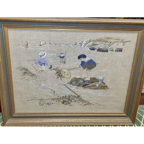 744 - A needlework Picture of Children playing.