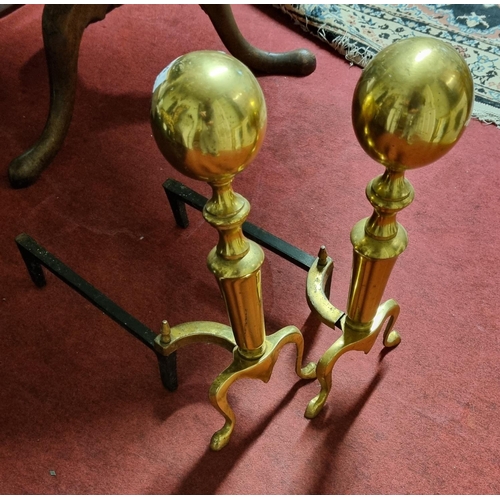 59 - A good pair of 19th early 20th Century Brass and Metal Fire Dogs. H 45 cm approx.