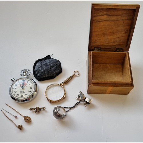 43 - A 19th Century Monocle, two Stick Pins, Stop Watch and other items in an Olive Wood Box.