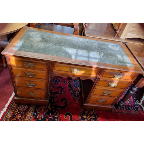 575 - A really fine late 19th Century Mahogany Desk with inset leather top over an arrangement of nine fri... 