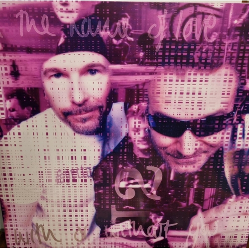 581 - A Promotional colour Print for U2 mounted but unframed. 70 x 70 cms approx.
