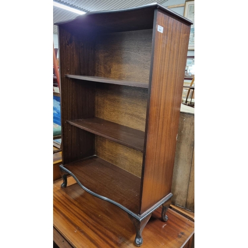 597 - A Mahogany veneered Open Bookshelves. W 72 x D 29 x H 107 cm approx.