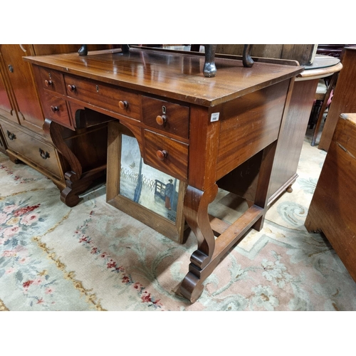 598 - A 19th Century Mahogany kneehole writing Desk with 5 small drawers. 99 x 56 x H 76 cm approx.