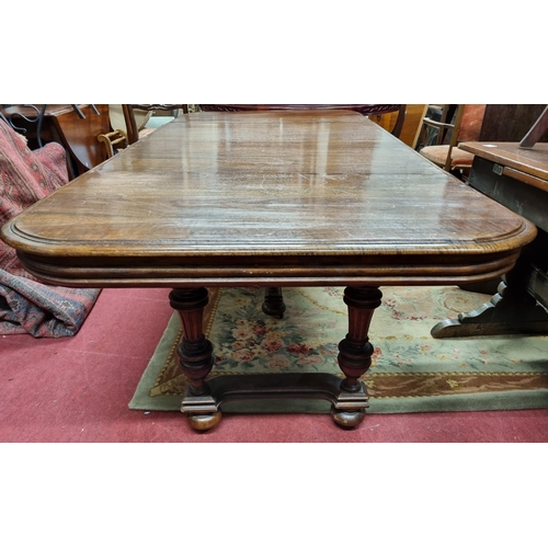 638 - A 19th Century Continental two leaf Dining Table with centre support. 104 x 212 x H 72 cm approx.