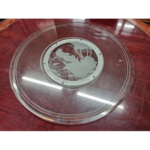 647 - A very large circular Oriental Dining Table with central circular spinning top on rectangular base. ... 