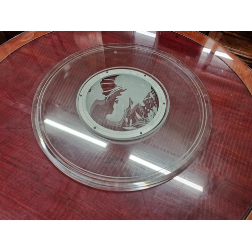 647 - A very large circular Oriental Dining Table with central circular spinning top on rectangular base. ... 