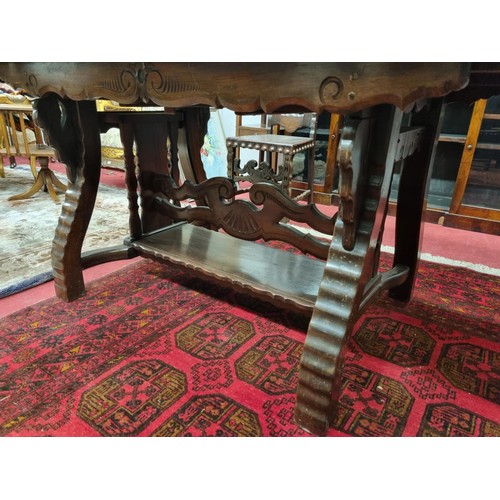 653 - A 20th Century Hardwood Dining room suite consisting of a pull out Table with two leaves H 77 x D 92... 