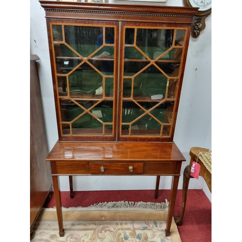 665 - A good 19th Century Cabinet on stand with inlaid panel doors and single drawer frieze on square tape... 