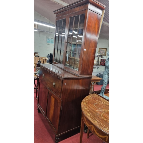 152 - A Georgian Mahogany Secretaire Bookcase with twin doors lions head handles and cornice top. H 224 x ... 