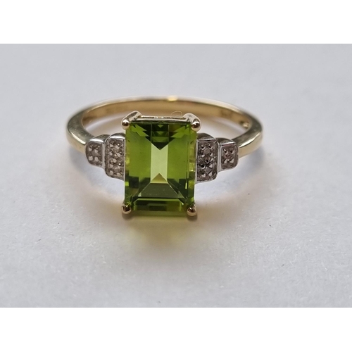 69 - A 9ct Gold, Diamond and Peridot Cluster Ring, size L.