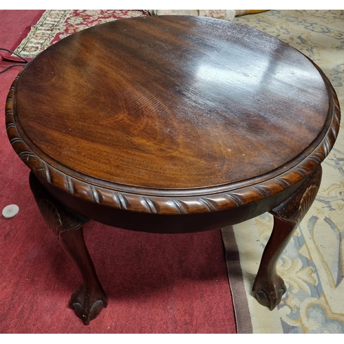 109 - A modern Mahogany Coffee Table with cabriole supports and rope edge. H 46 x diameter 58 cm approx.