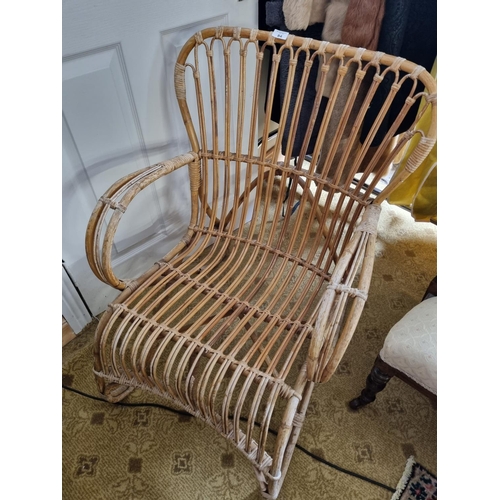 84 - A Wicker Chair. H 30 cm approx.