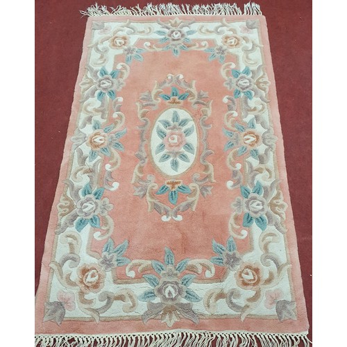 806 - Oriental Style Rug with Pink with Soft Tones of Cream and Green .
L 167 x W 89 cm approx.