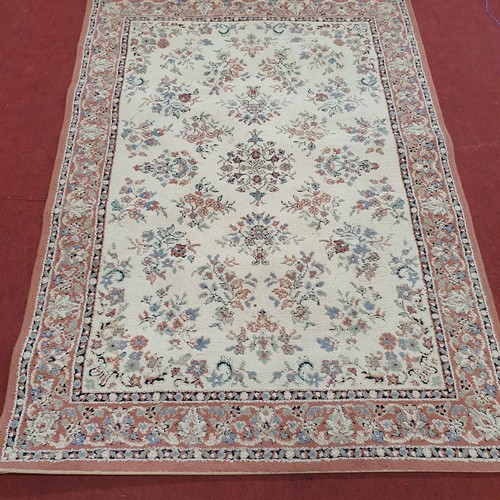 812 - A Salmon/Pink Rug with Cream tones .
L 170 x W 120 cm approx.