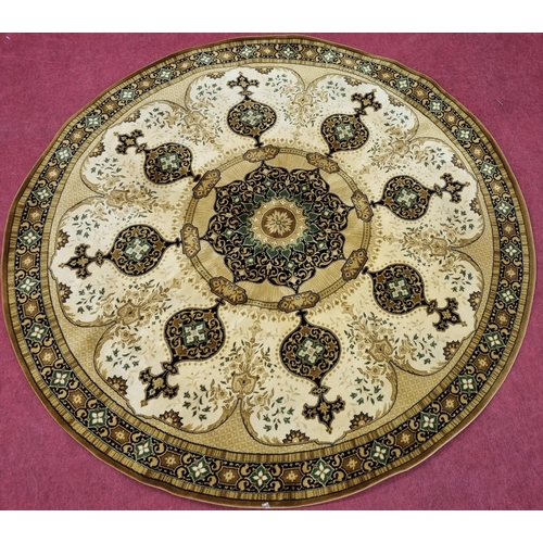 826 - A green/mustard circular Carpet with multi borders and floral centre motif. D 252 cm approx.