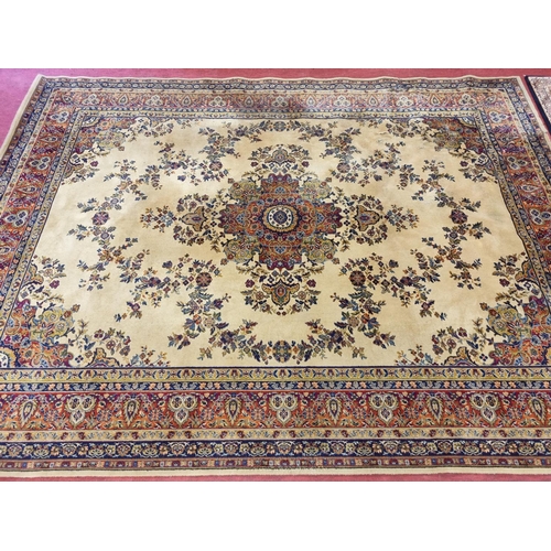833 - A yellow ground Carpet with foliate decoration, stepped border. slight damage. 360 x 273 cm approx.