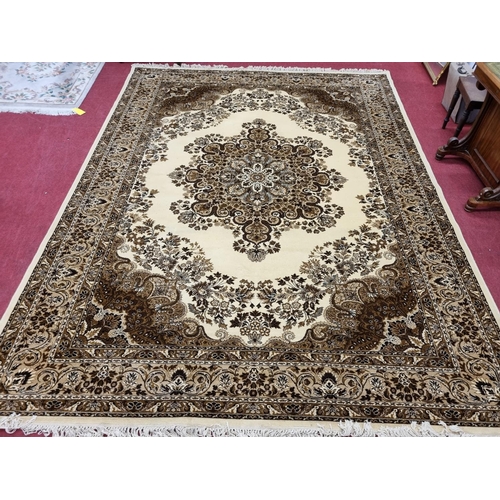 834 - A good Wool cream ground Carpet with multi borders and allover decoration. 270 x 365 cm approx.