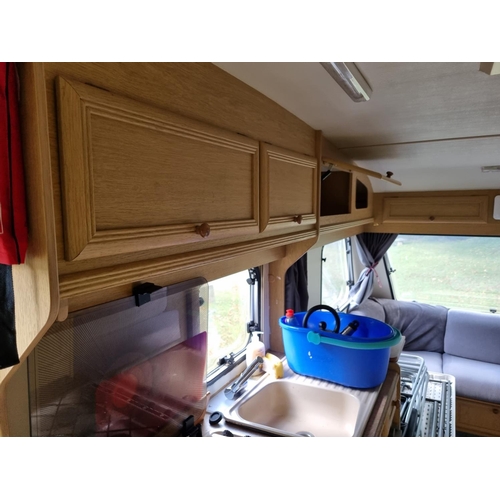 334 - A Sprite Major 5 berth caravan, year 1991, 
Comes with (all working according to the owner)

·      ... 