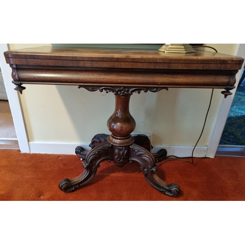 17 - A Fantastic early 19th Century Rosewood fold over Tea Table with highly carved scissors movement pod... 