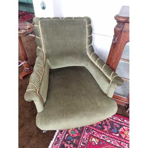 94 - A really good pair of late 19th Century easy Armchairs in green velvet upholstery and gold braid. H ... 