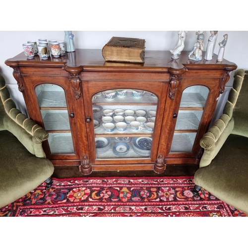 101 - A Fantastic 19th Century Mahogany three door Side Cabinet with arch top, glazed panel doors and carv... 
