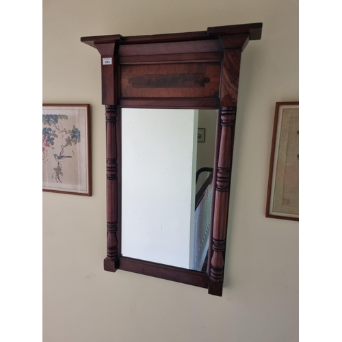 253 - An early 19th Century Mahogany and Rosewood Pire Mirror. 83 x 56 cm approx.