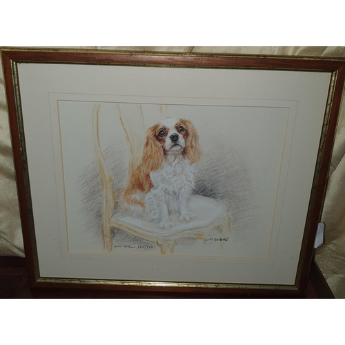 78 - Gil Evans. A signed limited edition coloured Print of a Spaniel sitting on a chair. 19 x 25 cms appr... 