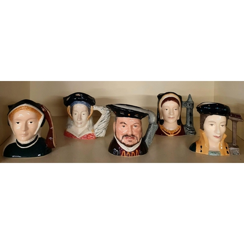 A mid size Royal Doulton Toby Jug a set of five of Henry V111 and four of his wives.