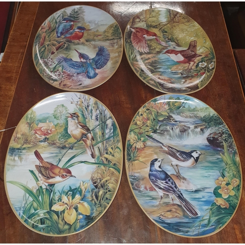 197 - A quantity of German Collectors Plates depicting Birds along with two Danbury Mint collectors plates... 