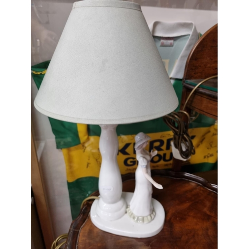 208 - Two Ceramic figural table Lamps.