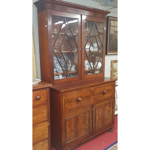 216 - A William 1Vth Figured Mahogany Secretaire Bookcase with a fully fitted interior. W 126 x D 57 x H 2... 