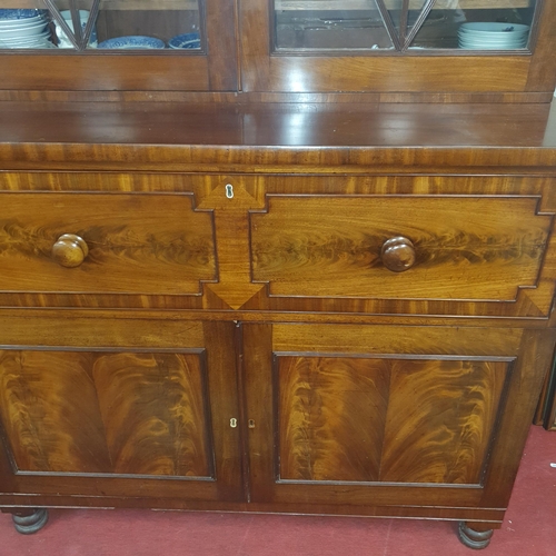 216 - A William 1Vth Figured Mahogany Secretaire Bookcase with a fully fitted interior. W 126 x D 57 x H 2... 