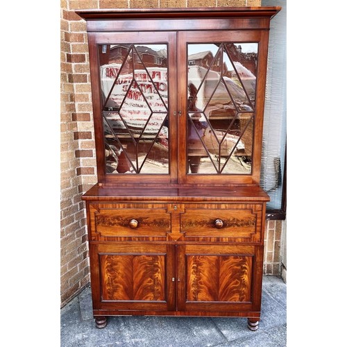 216 - A William 1Vth Figured Mahogany Secretaire Bookcase with a fully fitted interior. W 126 x D 57 x H 2... 