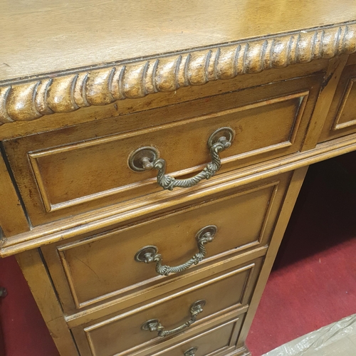 235 - A late 19th early 20th Century Mahogany Pedestal Desk with a rope edge outline and brass swan neck h... 