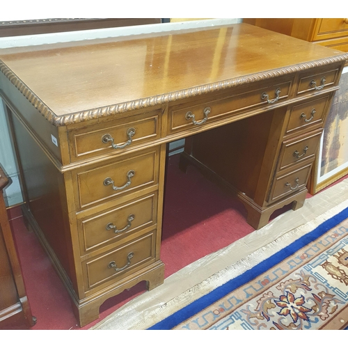 235 - A late 19th early 20th Century Mahogany Pedestal Desk with a rope edge outline and brass swan neck h... 